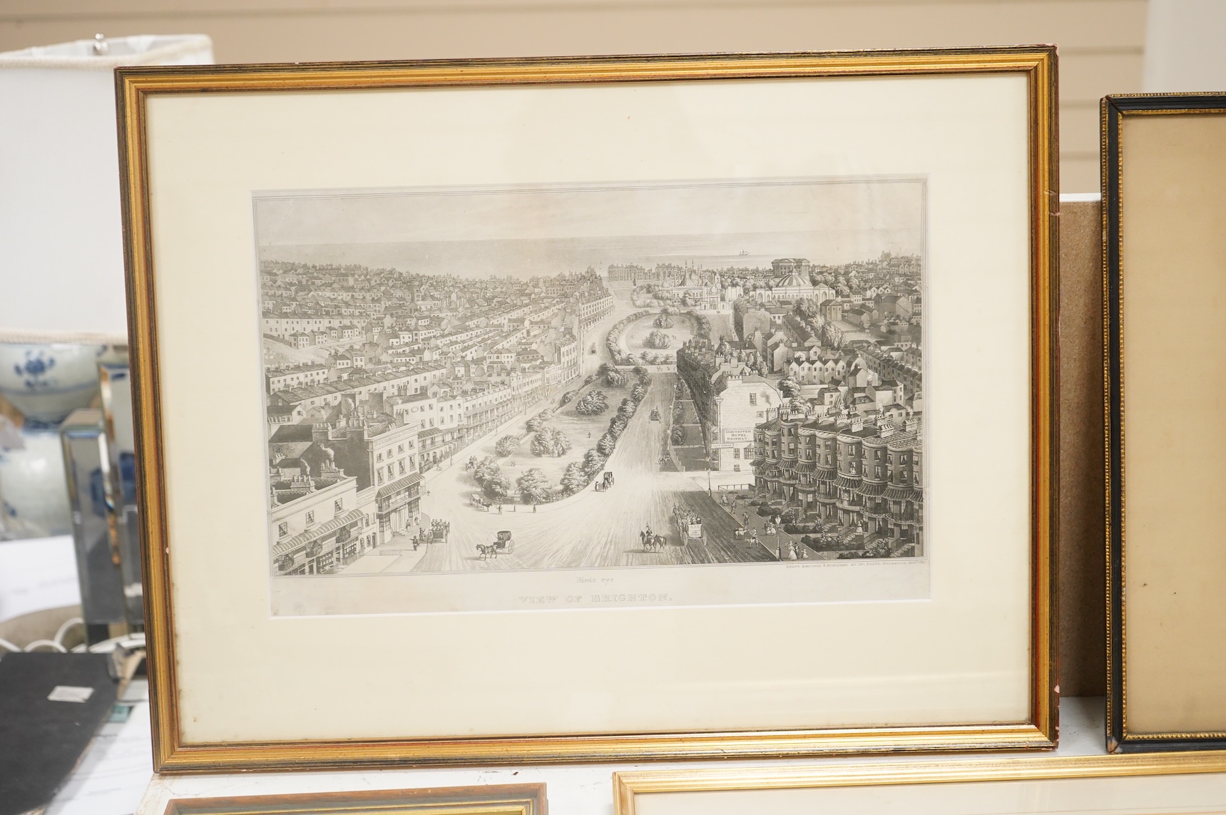 A collection of 19th century and later prints, some Brighton interest to include: Summer's evening at the Royal Marine Library, Brighton, The Lanes and other views of Worthing, Hastings and near Beachy Head, largest 35 x